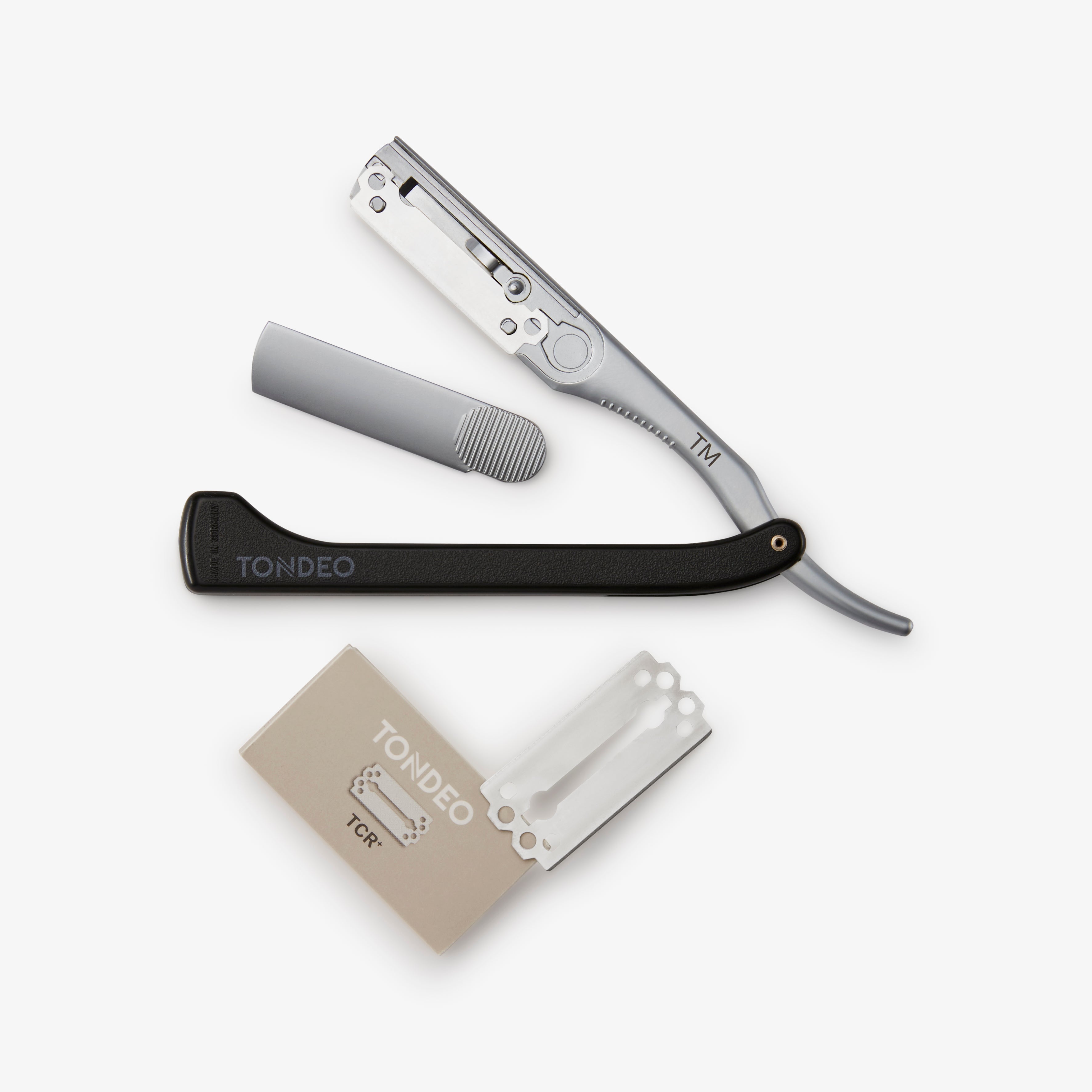 Hochwertiges TONDEO Rasiermesser für Barbiere und Friseure – präzises Schneidwerkzeug mit Wechselklinge, deutsche Qualität aus Solingen mit ergonomischem Griff und scharfer Klinge