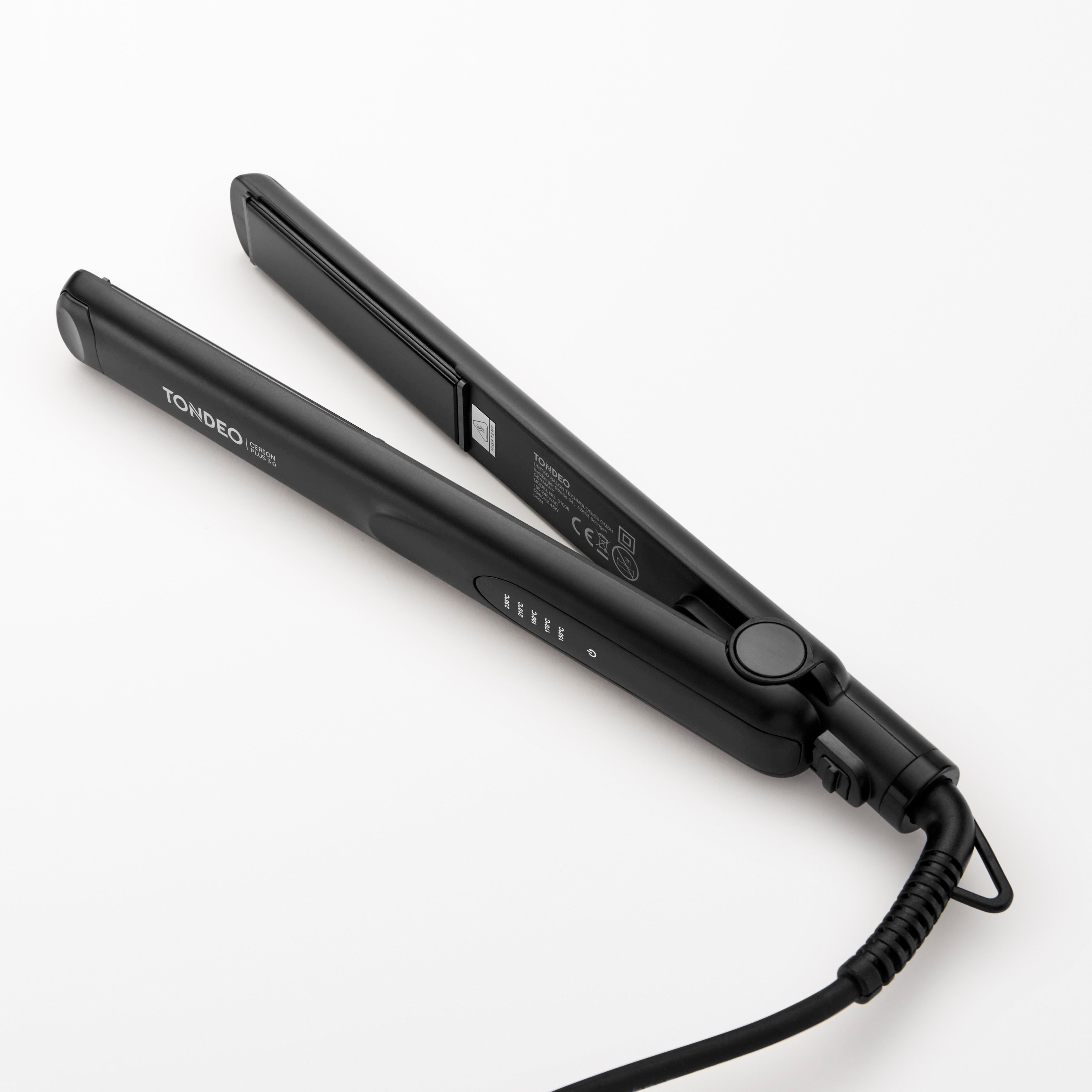 Schwarzes Glätteisen von TONDEO Solingen, Drehkupplung, stufenlose Steuerung, federnd gelagerte Heizelemente, optimale Wärmeverteilung, Auto-Off-Funktion, Keramikbeschichtung, Stylingeisen für den Friseur