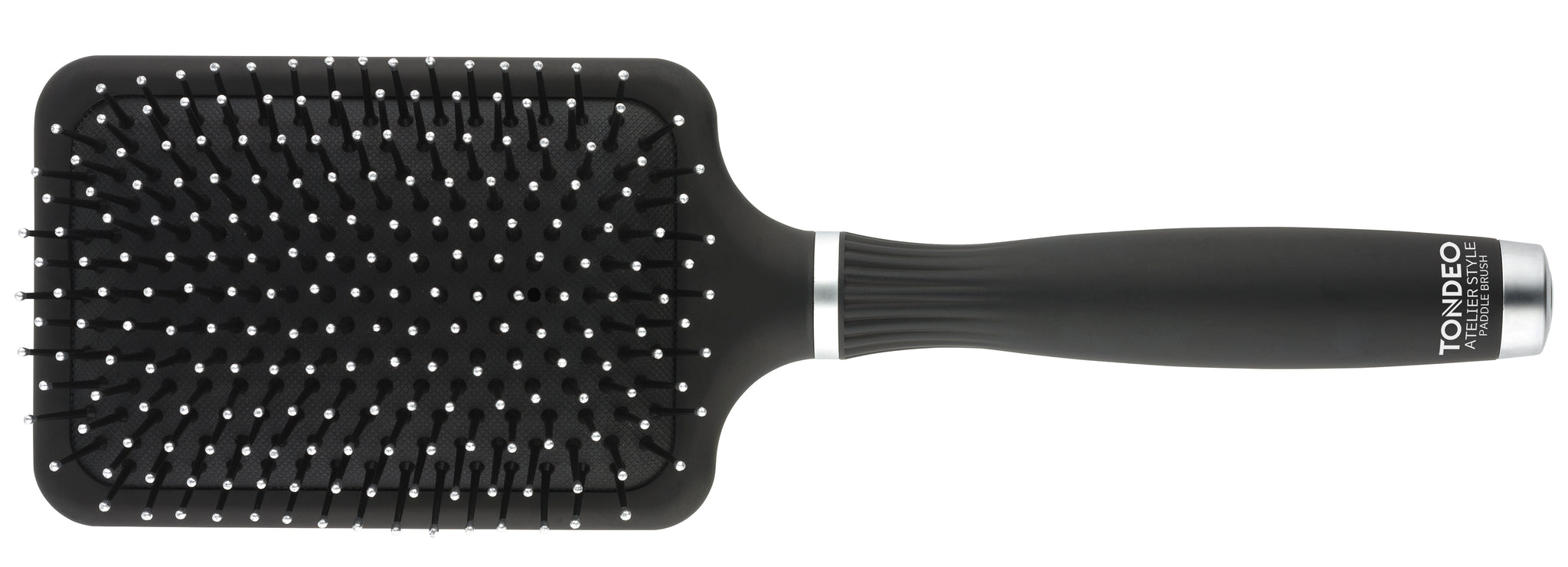 Schwarze Haarbürste mit Noppen.
