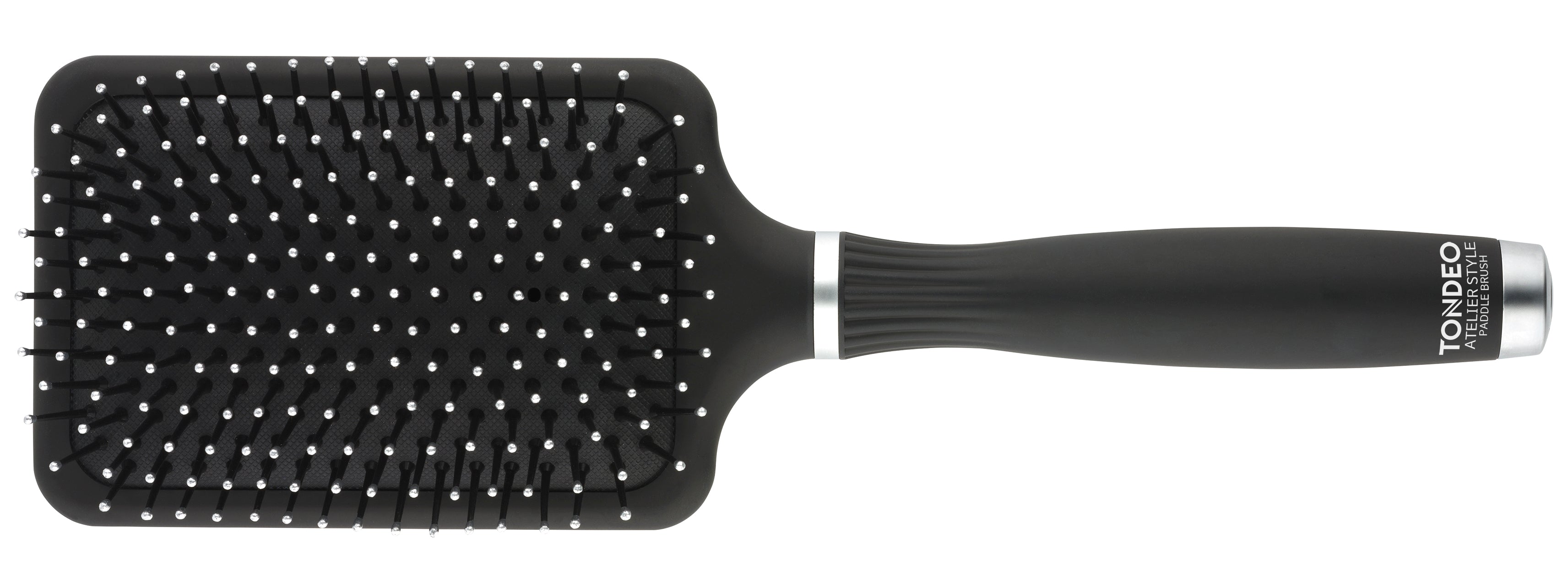 Schwarze Haarbürste mit Noppen.