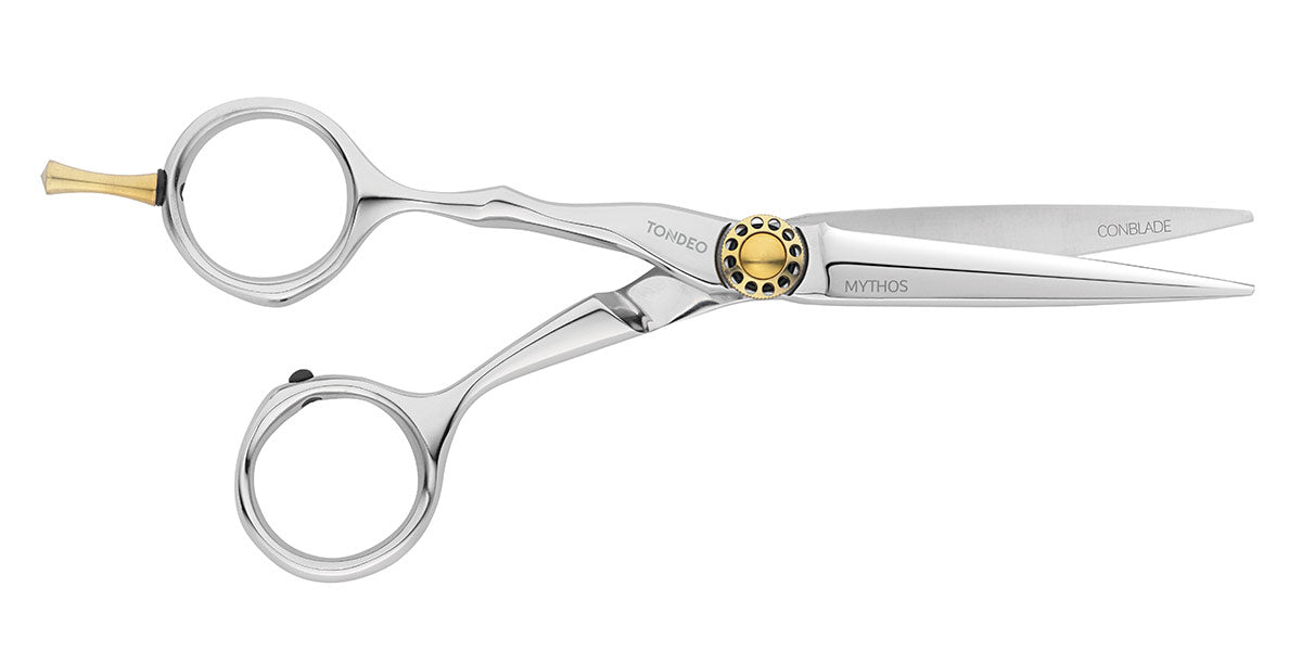 Friseurschere mit goldenen Details.